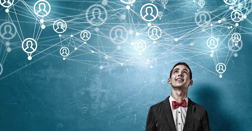 Modern communication technology concept with student guy in glasses